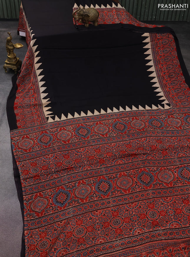 Modal silk saree black and maroon with plain body and ajrakh printed border & pallu