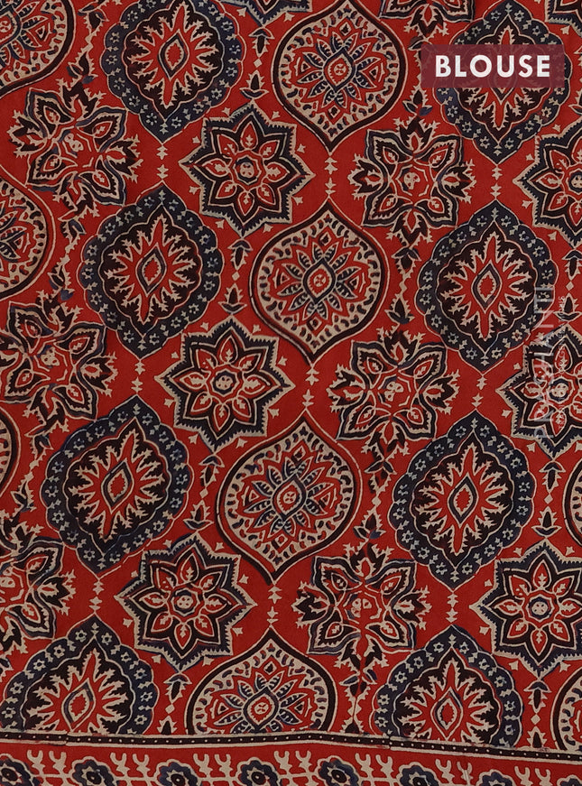 Modal silk saree black and orange with plain body and ajrakh printed pallu & blouse