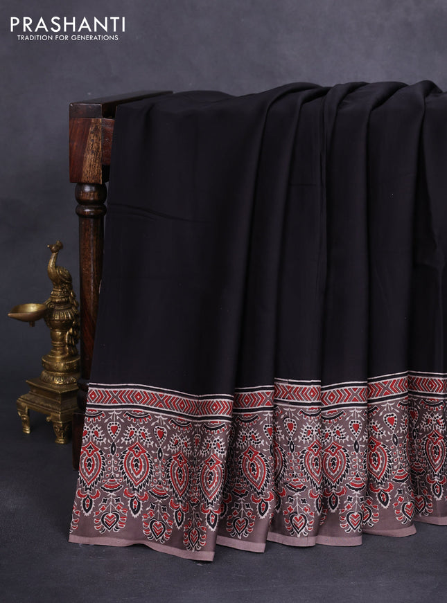 Modal silk saree black and brown with plain body and ajrakh printed border & pallu
