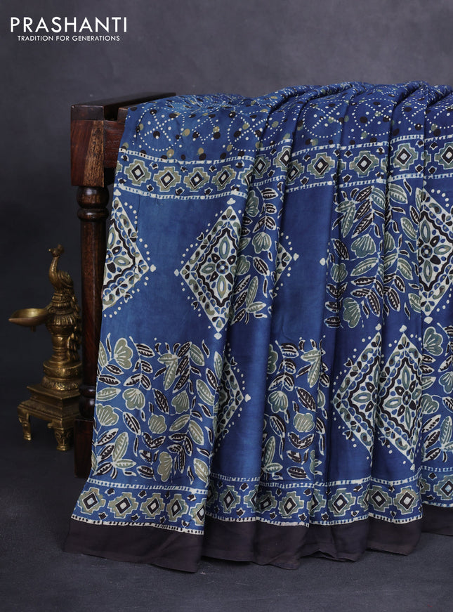 Modal silk saree blue and black with allover ajrakh prints and printed border