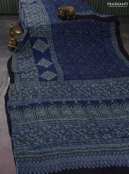 Modal silk saree blue and black with allover ajrakh prints and printed border