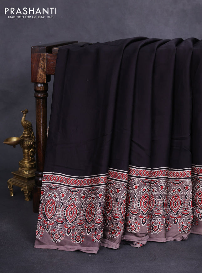 Modal silk saree black and grey with plain body and ajrakh printed border & pallu