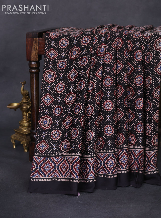 Modal silk saree black with allover ajrakh prints and printed border