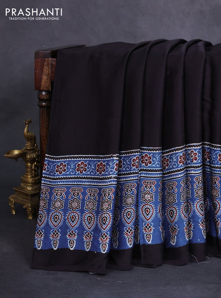 Modal silk saree black and blue with plain body and ajrakh printed border & pallu