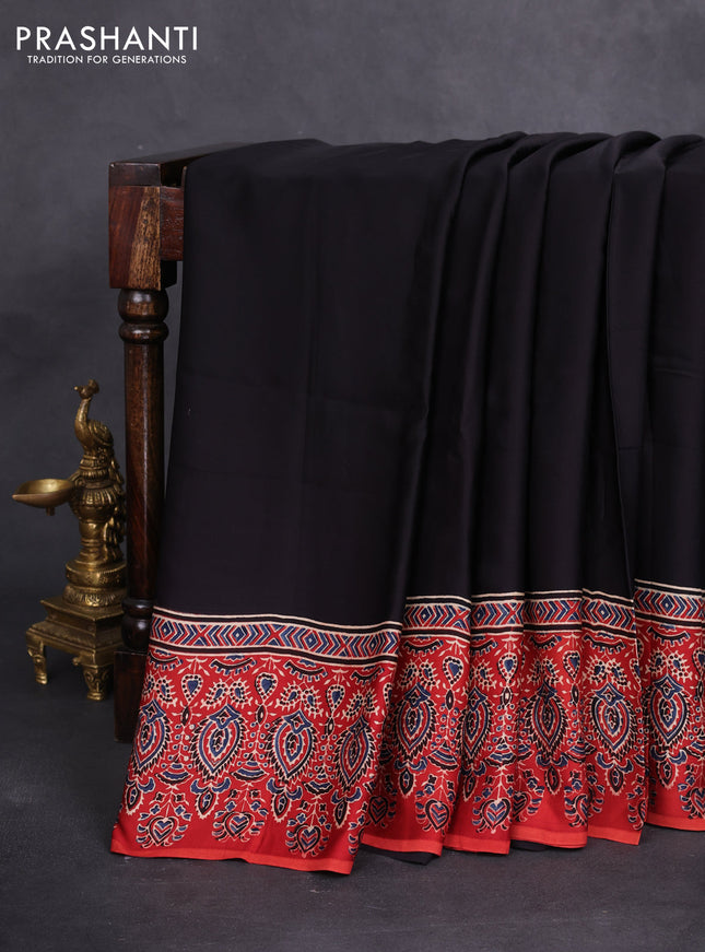 Modal silk saree black and red with plain body and ajrakh printed pallu & blouse