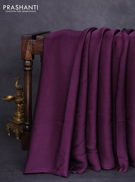 Modal silk saree deep wine and black with plain body and ajrakh printed pallu & blouse