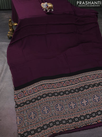 Modal silk saree deep wine and black with plain body and ajrakh printed pallu & blouse