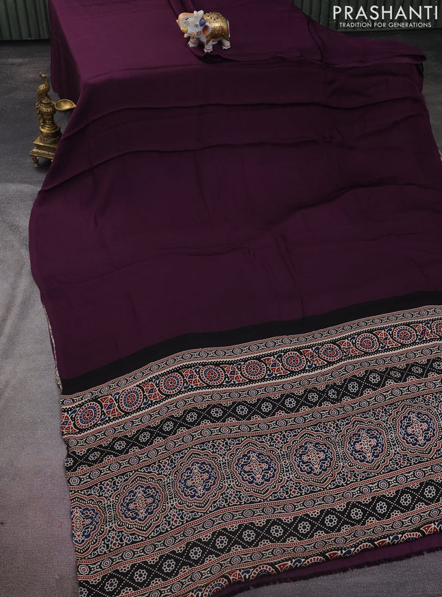 Modal silk saree deep wine and black with plain body and ajrakh printed pallu & blouse