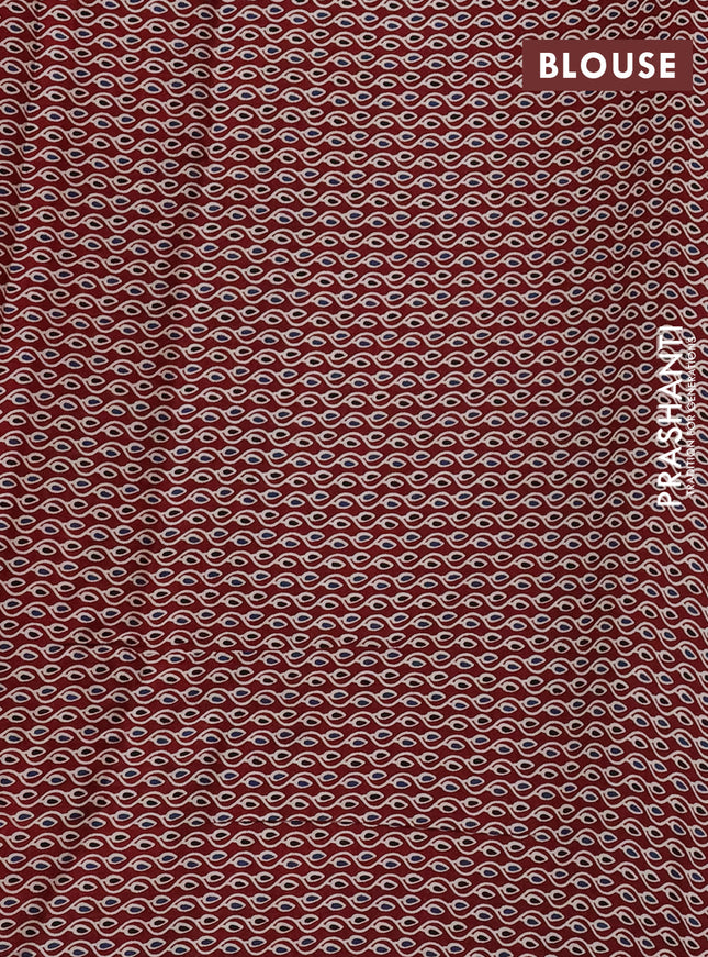 Modal silk saree pink and maroon with plain body and ajrakh printed pallu & blouse