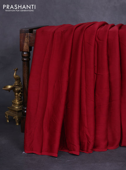 Modal silk saree maroon and peacock blue with plain body and ajrakh printed pallu & blouse