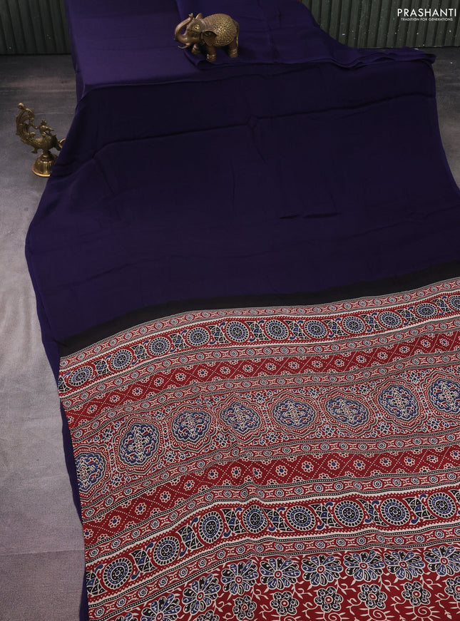 Modal silk saree dark blue and maroon with plain body and ajrakh printed pallu & blouse