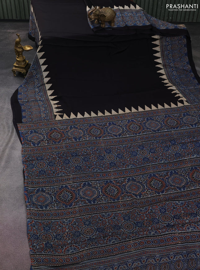 Modal silk saree black and blue with plain body and ajrakh printed border & pallu