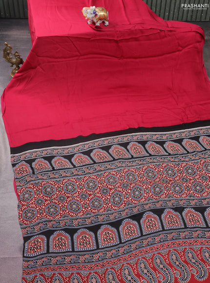 Modal silk saree maroon and black with plain body and ajrakh printed pallu & blouse