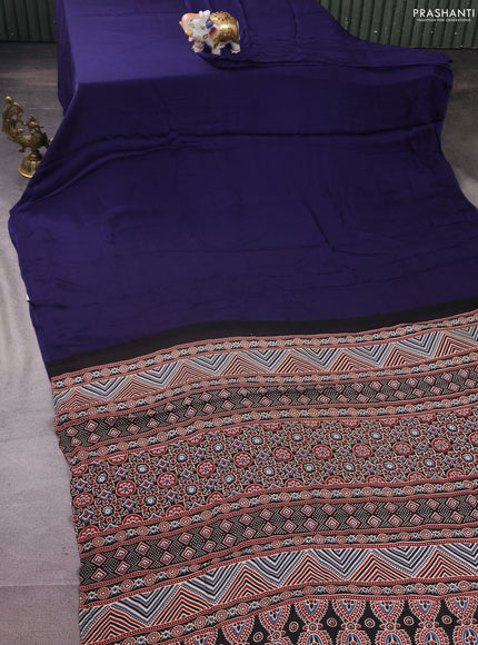 Modal silk saree blue and black with plain body and ajrakh printed pallu & blouse