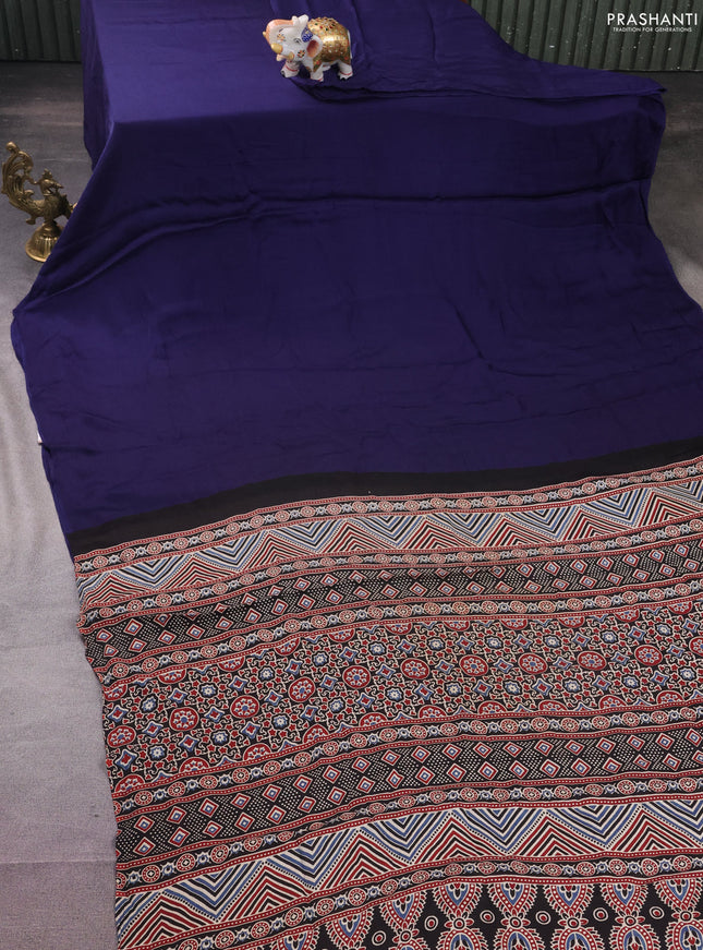 Modal silk saree blue and black with plain body and ajrakh printed pallu & blouse