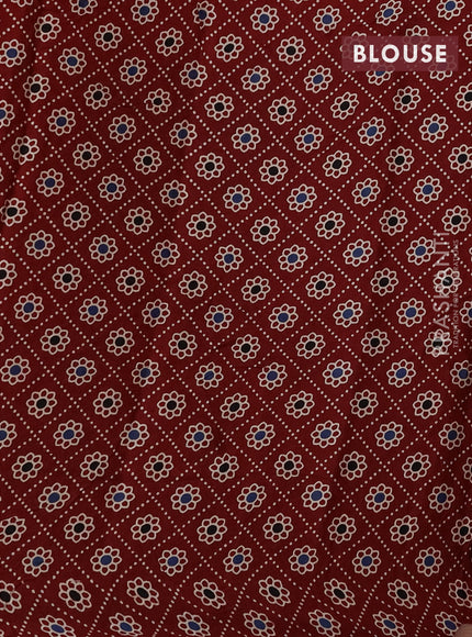 Modal silk saree dark pink and maroon with plain body and ajrakh printed pallu & blouse