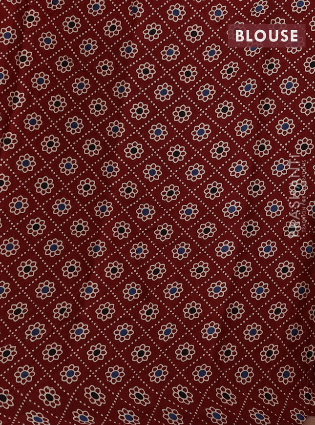 Modal silk saree dark pink and maroon with plain body and ajrakh printed pallu & blouse