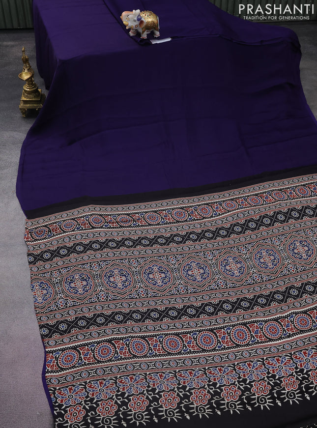 Modal silk saree blue and black with plain body and ajrakh printed pallu & blouse