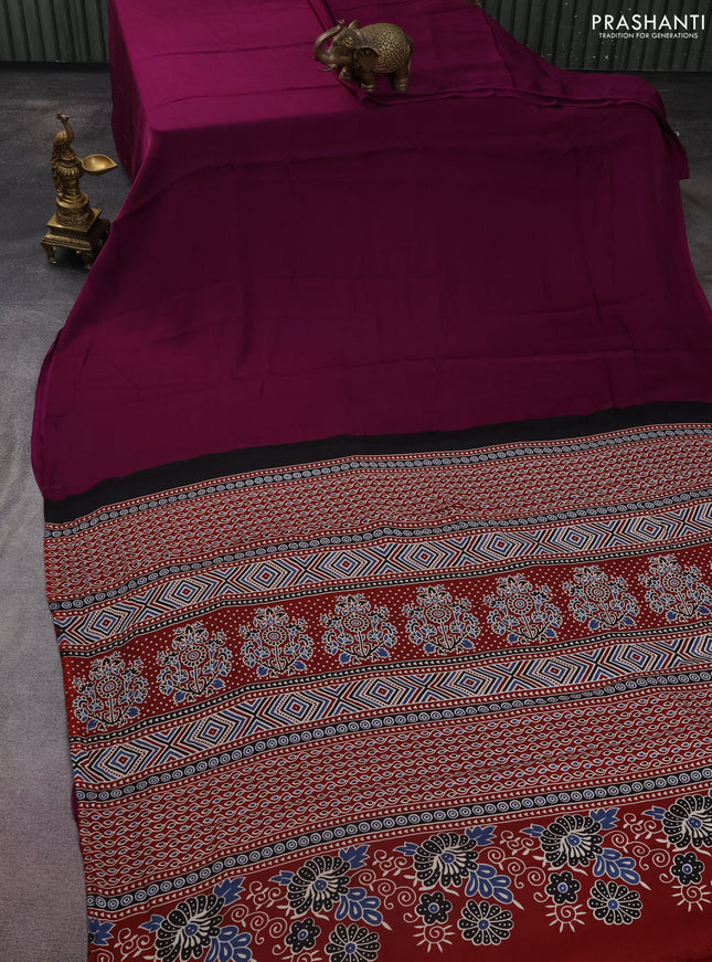 Modal silk saree purple and maroon with plain body and ajrakh printed pallu & blouse