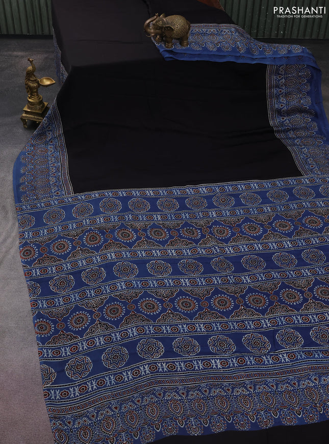 Modal silk saree black and blue with plain body and ajrakh printed border & pallu