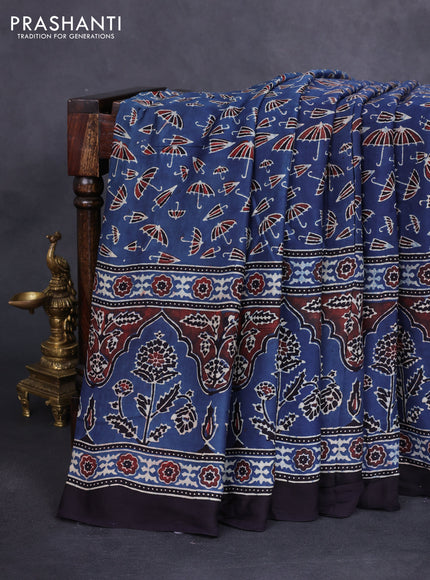 Modal silk saree blue and black with allover ajrakh prints and printed border