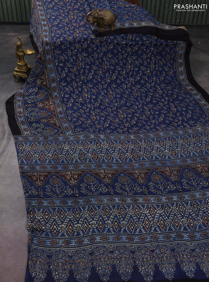 Modal silk saree blue and black with allover ajrakh prints and printed border