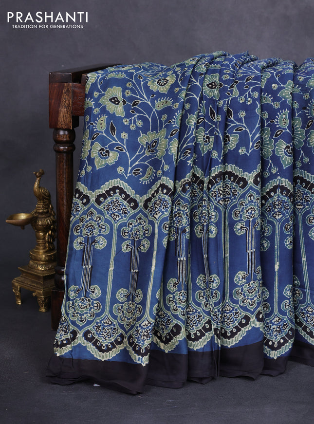 Modal silk saree blue and black with allover ajrakh prints and printed border