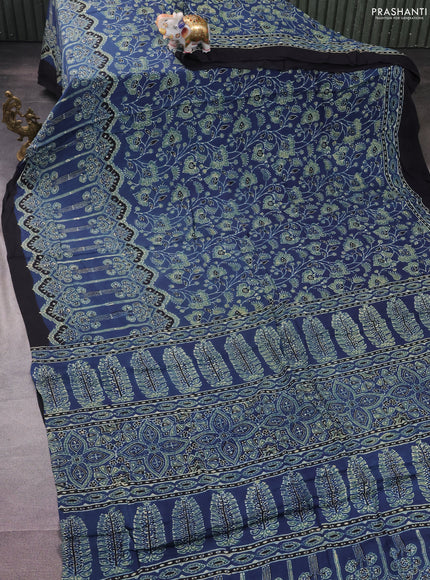 Modal silk saree blue and black with allover ajrakh prints and printed border