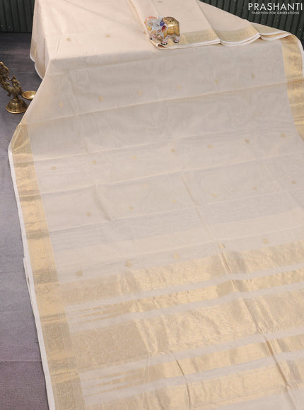 Kanchi cotton saree cream with zari woven buttas and zari woven border