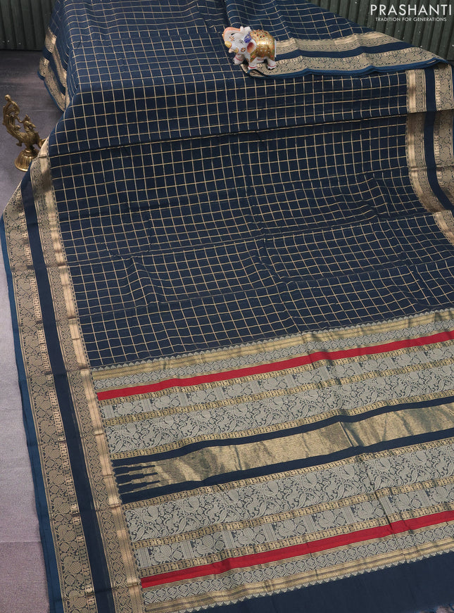 Kanchi cotton saree peacock blue with allover zari checked pattern and rettapet zari woven border