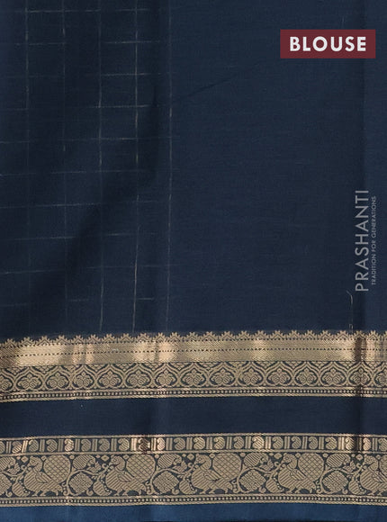 Kanchi cotton saree peacock blue with allover zari checked pattern and rettapet zari woven border