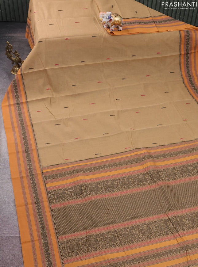 Kanchi cotton saree beige and mustard shade with thread woven buttas and thread woven border