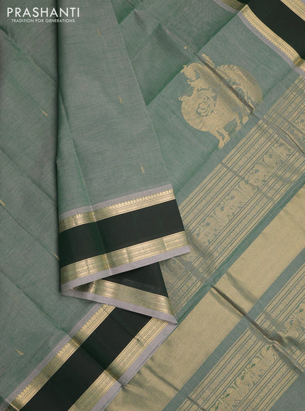 Kanchi cotton saree pastel green and dark green with plain body and rettapet zari woven border