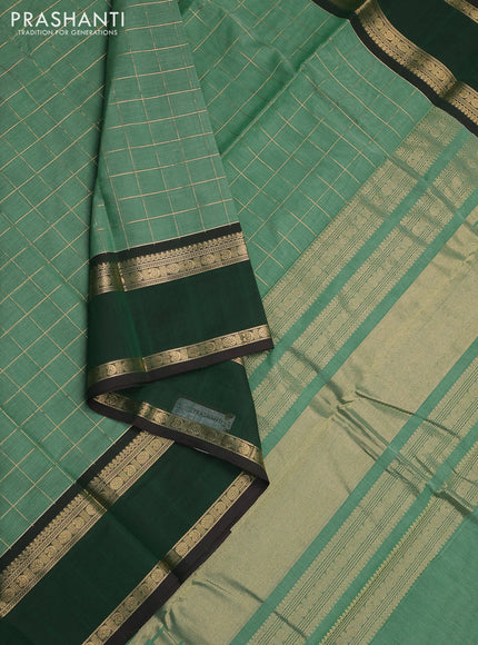 Kanchi cotton saree pastel green and dark green with allover zari checked pattern and rettapet zari woven border