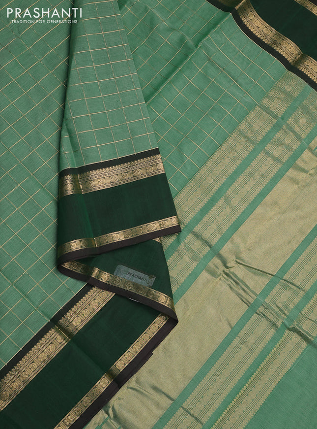 Kanchi cotton saree pastel green and dark green with allover zari checked pattern and rettapet zari woven border