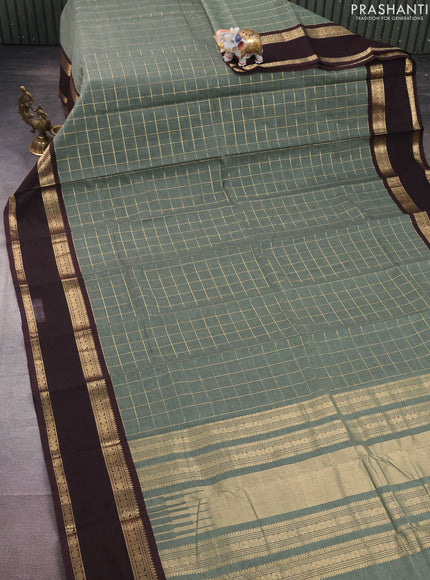 Kanchi cotton saree pastel green and coffee brown with allover zari checked pattern and rettapet zari woven border