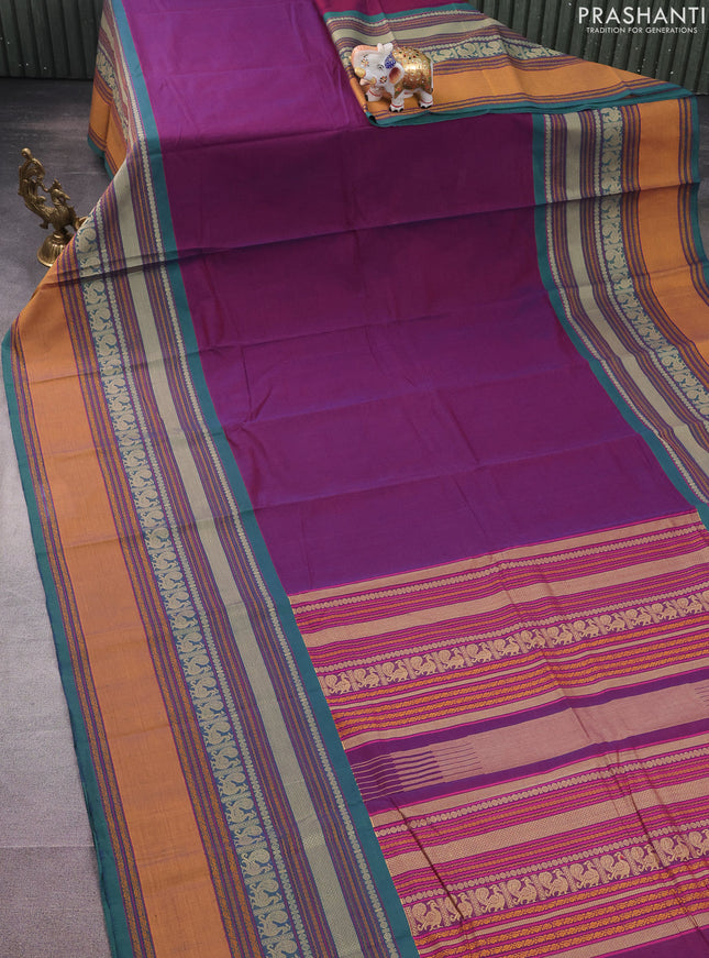 Kanchi cotton saree dual shade of purple and green with plain body and long thread woven border