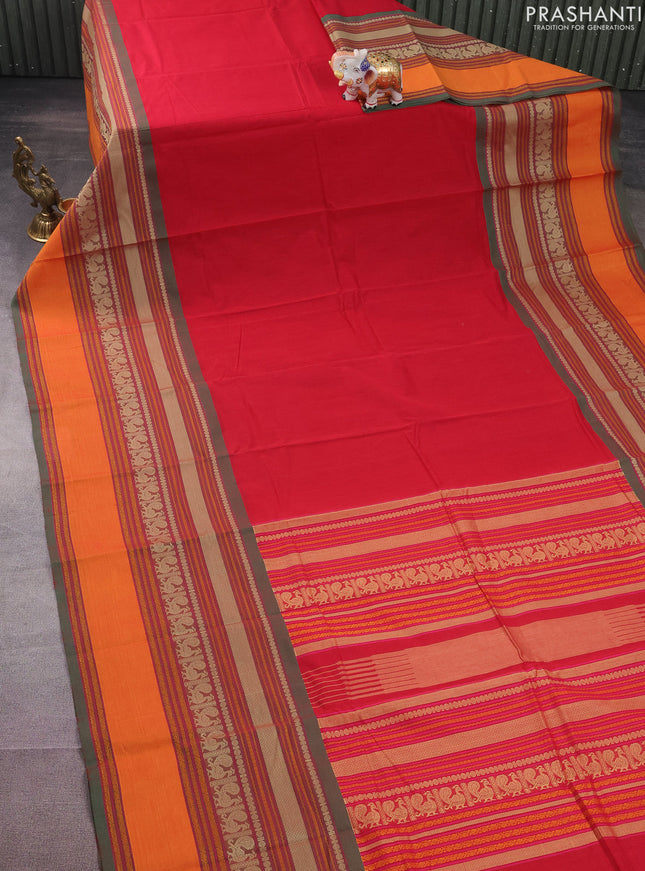 Kanchi cotton saree red and green with plain body and long thread woven border