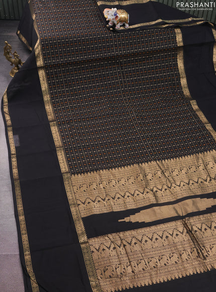 Kanchi cotton saree black with allover thread checked pattern & 1000 buttas and long rettapet zari woven border