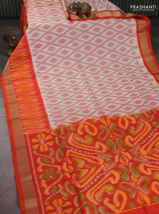 Ikat soft silk saree cream and orange with allover ikat weaves and zari woven border