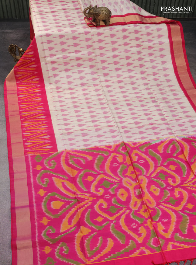 Ikat soft silk saree cream and pink with allover ikat butta weaves and long ikat woven zari border
