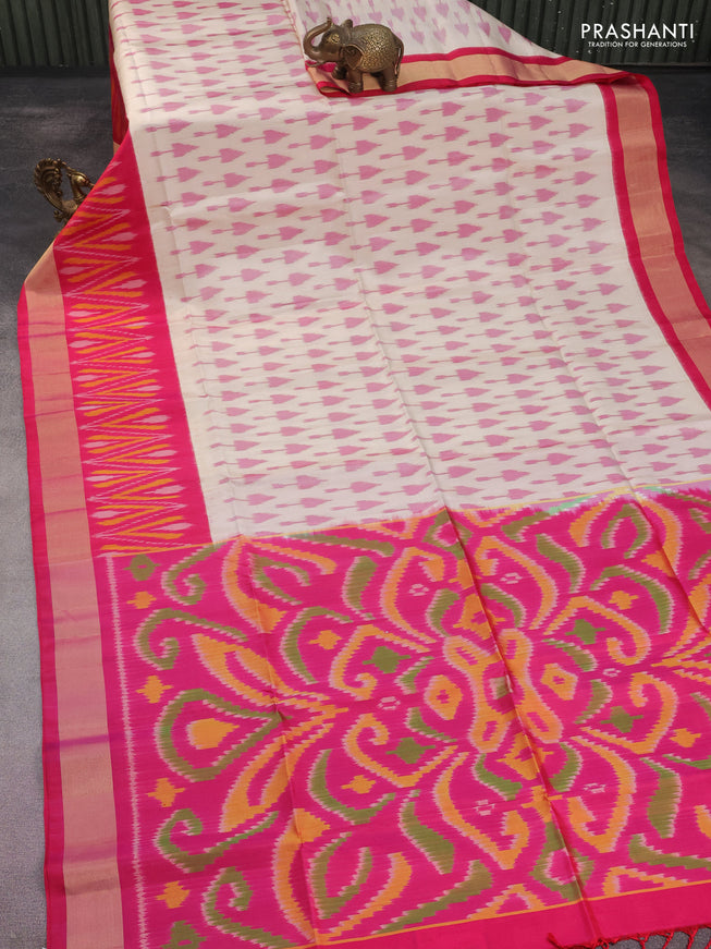 Ikat soft silk saree cream and pink with allover ikat butta weaves and long ikat woven zari border