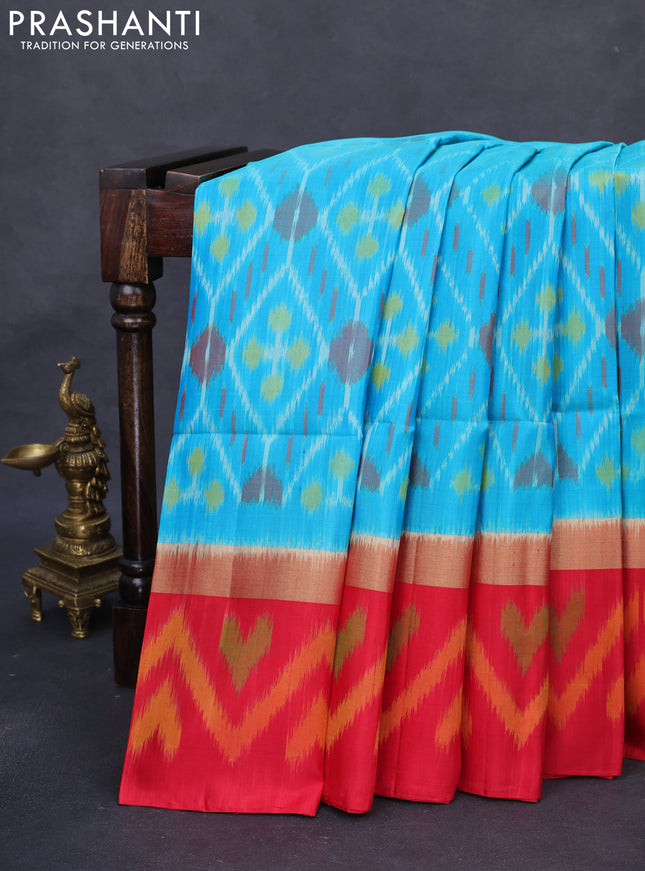 Ikat soft silk saree teal blue and red with allover ikat weaves and long zari woven ikat style border