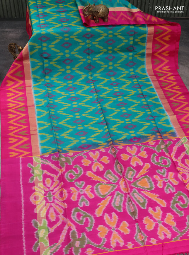 Ikat soft silk saree teal green and pink with allover ikat weaves and long zari woven ikat style border