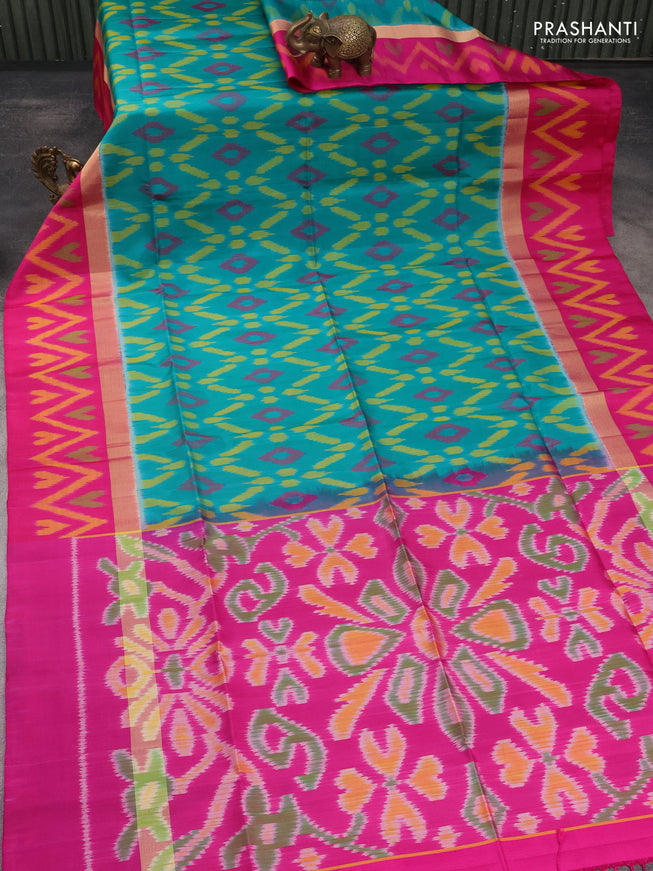Ikat soft silk saree teal green and pink with allover ikat weaves and long zari woven ikat style border