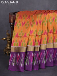 Ikat soft silk saree mustard yellow and deep purple with allover ikat weaves and long zari woven ikat style border