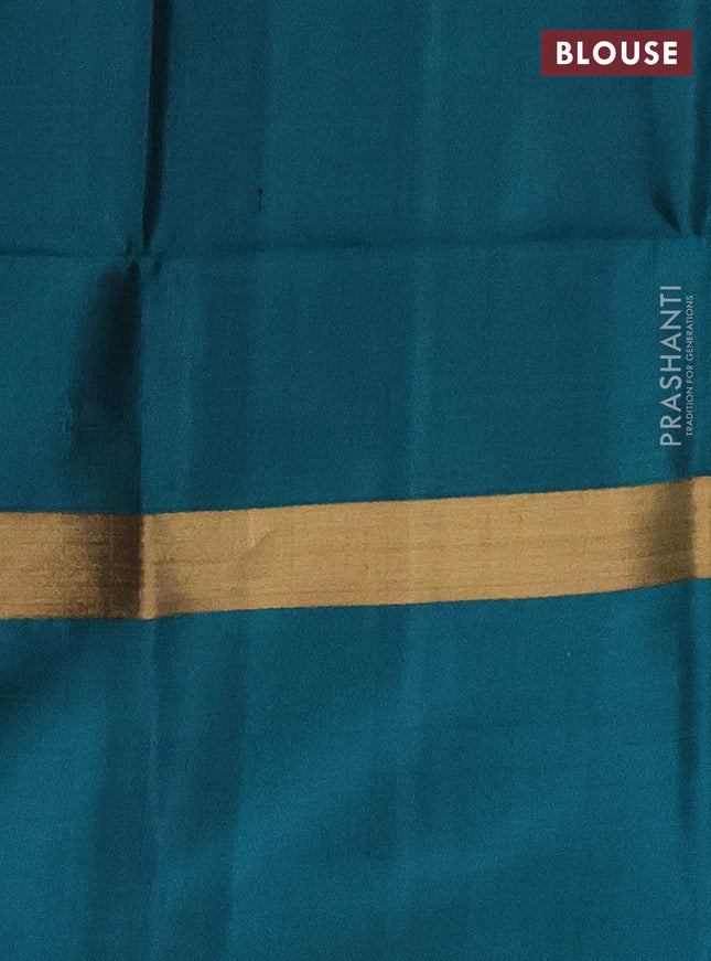 Ikat soft silk saree purple and peacock green with allover ikat weaves and long zari woven ikat style border