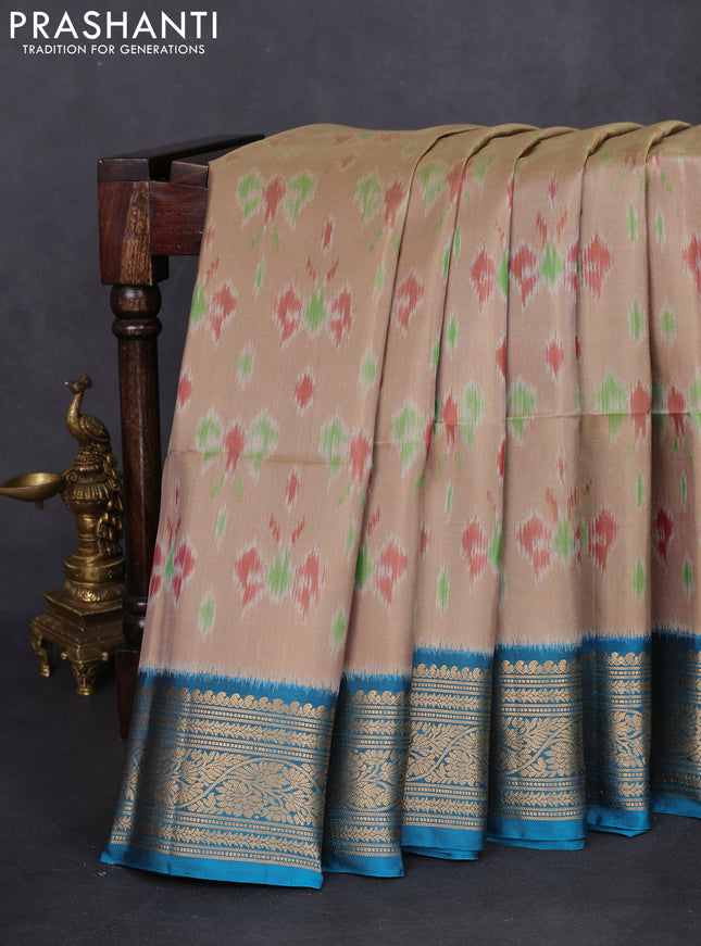 Ikat soft silk saree beige and cs blue with allover ikat weaves and zari woven border