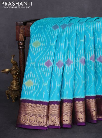 Ikat soft silk saree teal blue and violet with allover ikat weaves and zari woven border