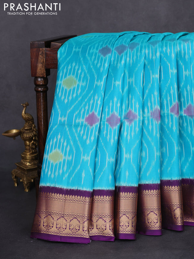 Ikat soft silk saree teal blue and violet with allover ikat weaves and zari woven border